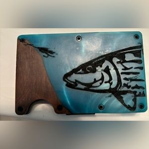 Brand new wallet with fish design bought from a local shop. Never been used